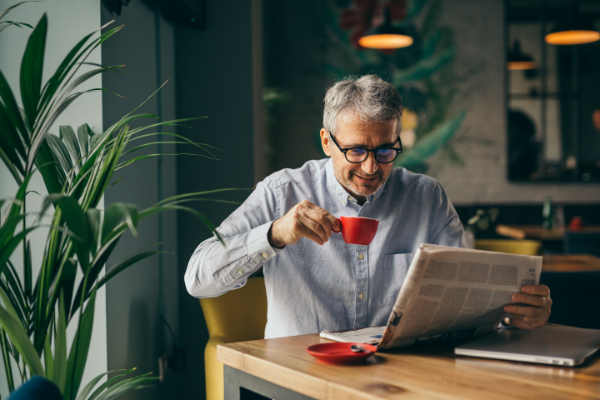 255531110-business-man-reading-paper-600px